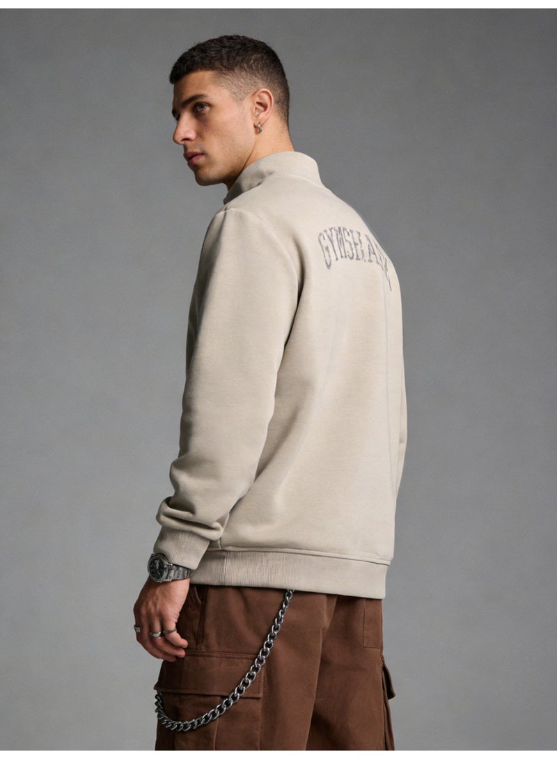 Gymshark beige quarter zip pullover - a large sports shirt with a shiny logo, suitable for neutral sports and casual styles - Image 4